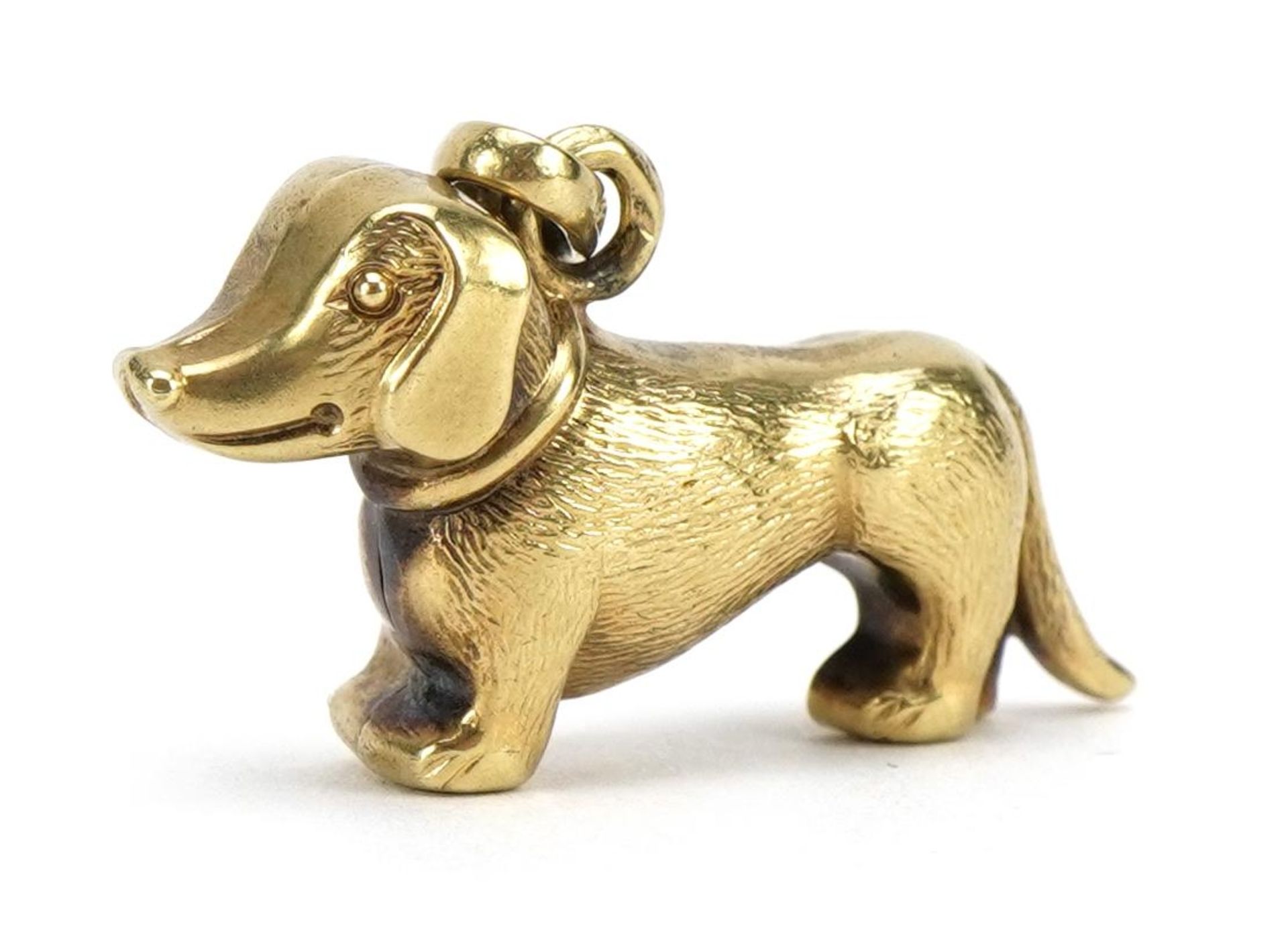 9ct gold Dachshund dog charm, 2.7cm wide, 1.8g