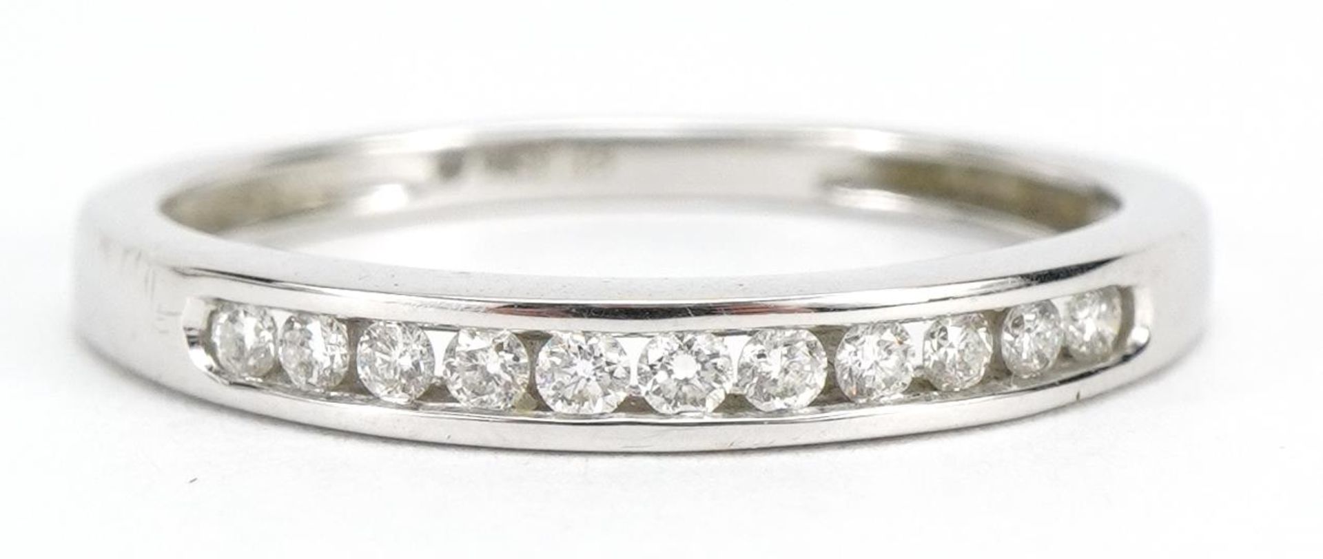 9ct white gold diamond half eternity ring, the band stamped 0.15ct, size N, 1.8g