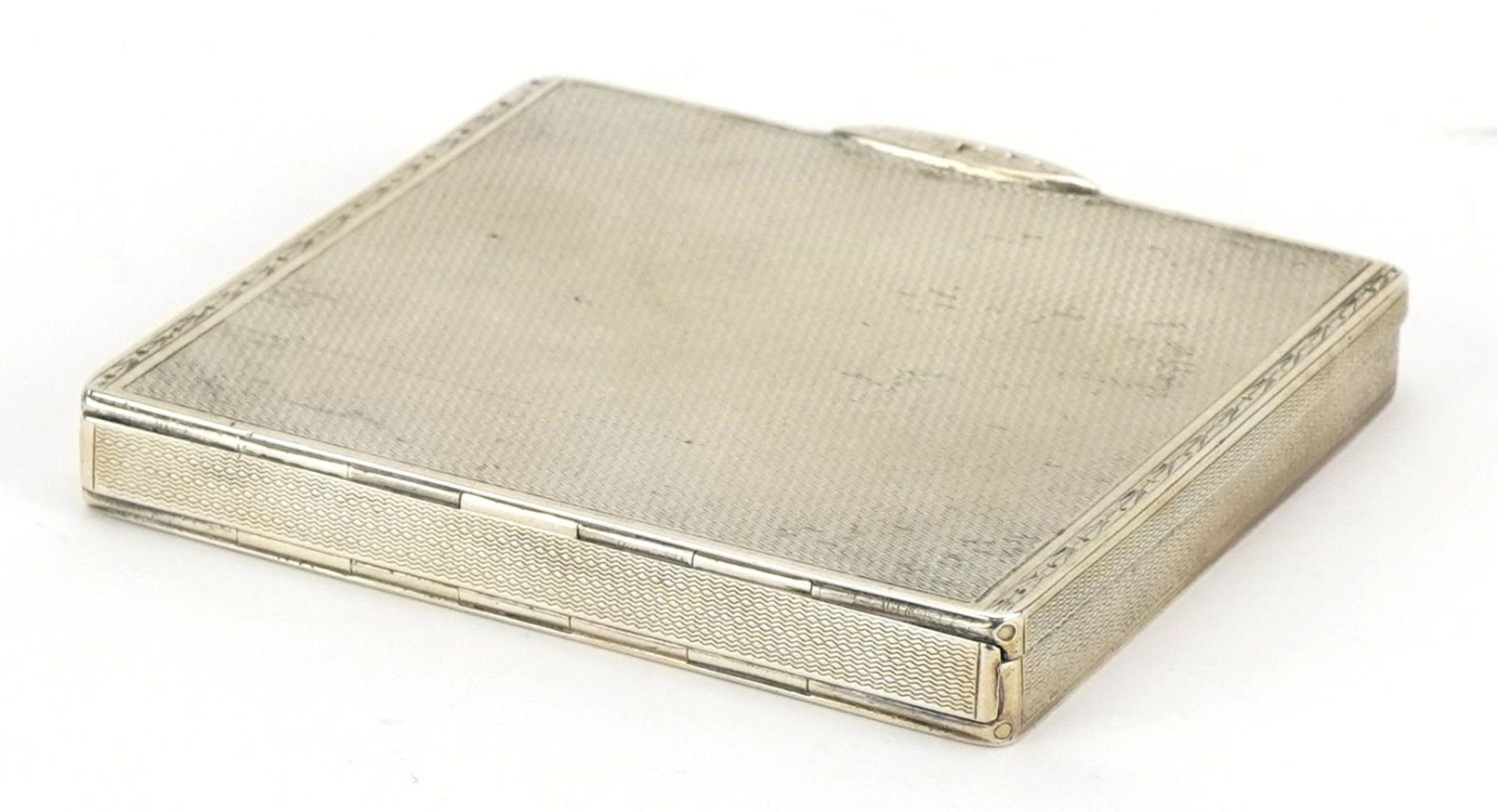 William Base & Sons, George V rectangular silver cigarette case with engine turned decoration and - Image 2 of 4
