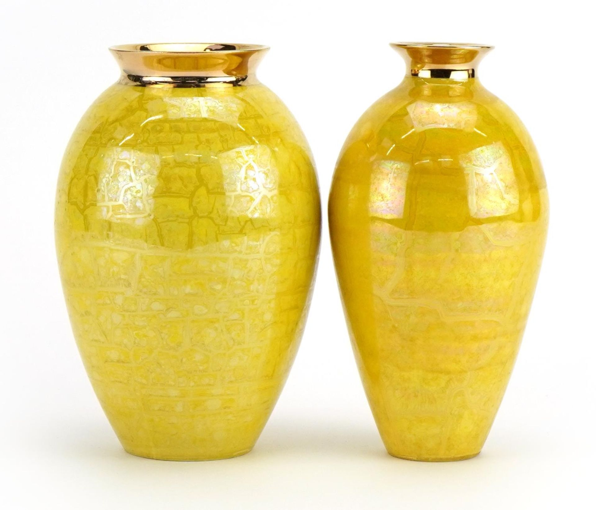 Atkinson Jones, two contemporary lustreware vases having yellow glazes, each 16.5cm high