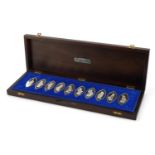 Set of ten Queen's Silver Jubilee The Queen's Beasts silver ingots arranged in a fitted mahogany