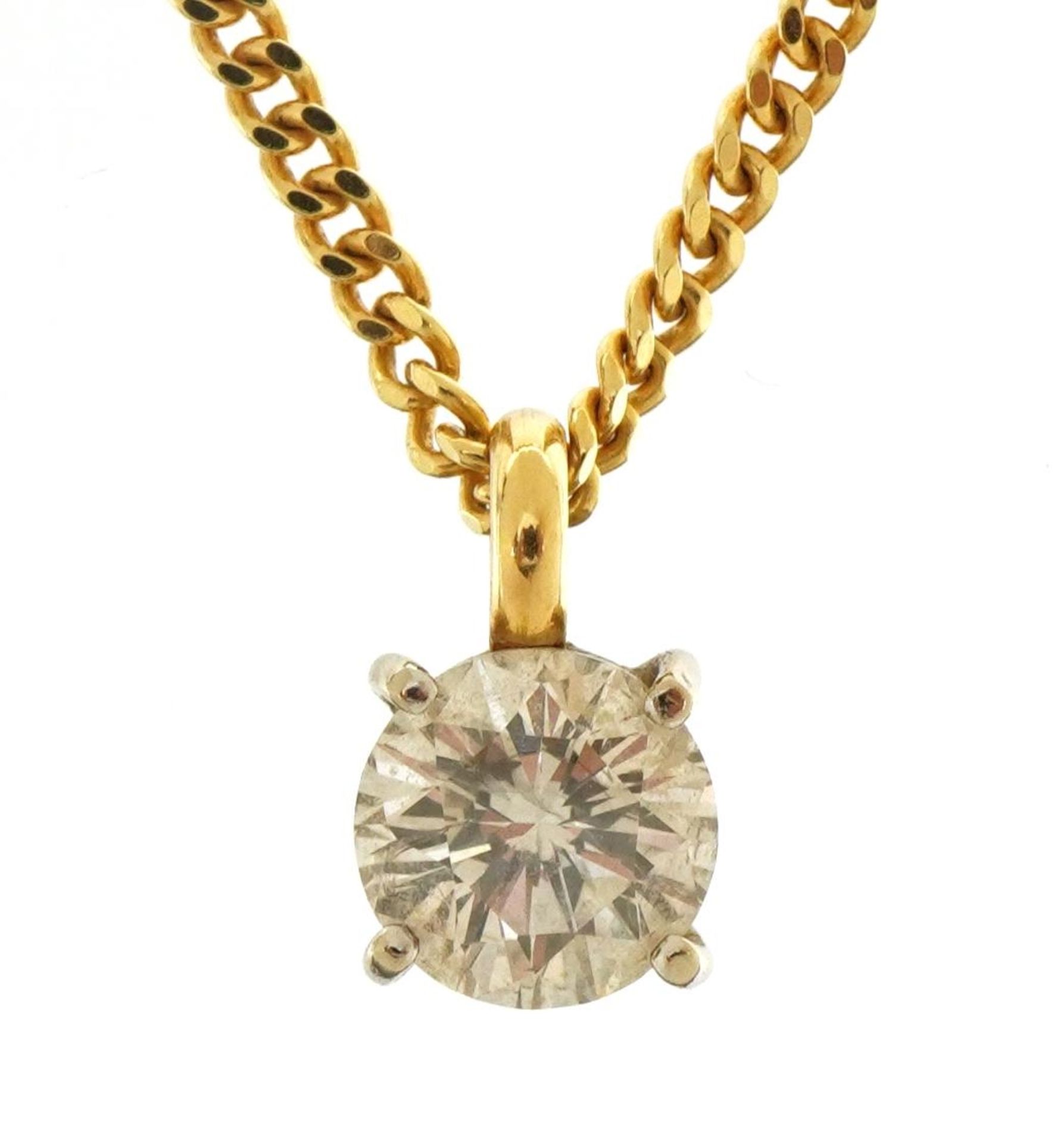 Near 1ct diamond solitaire pendant on an 18ct gold curb link necklace, the diamond approximately 0.