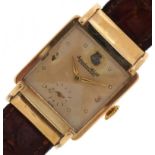 International Watch Co, gentlemen's 9ct gold wristwatch with Omega brown leather strap, the dial