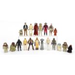 Twenty vintage Star Wars action figures including Luke Skywalker as Stormtrooper, Yoda, Ewoks and