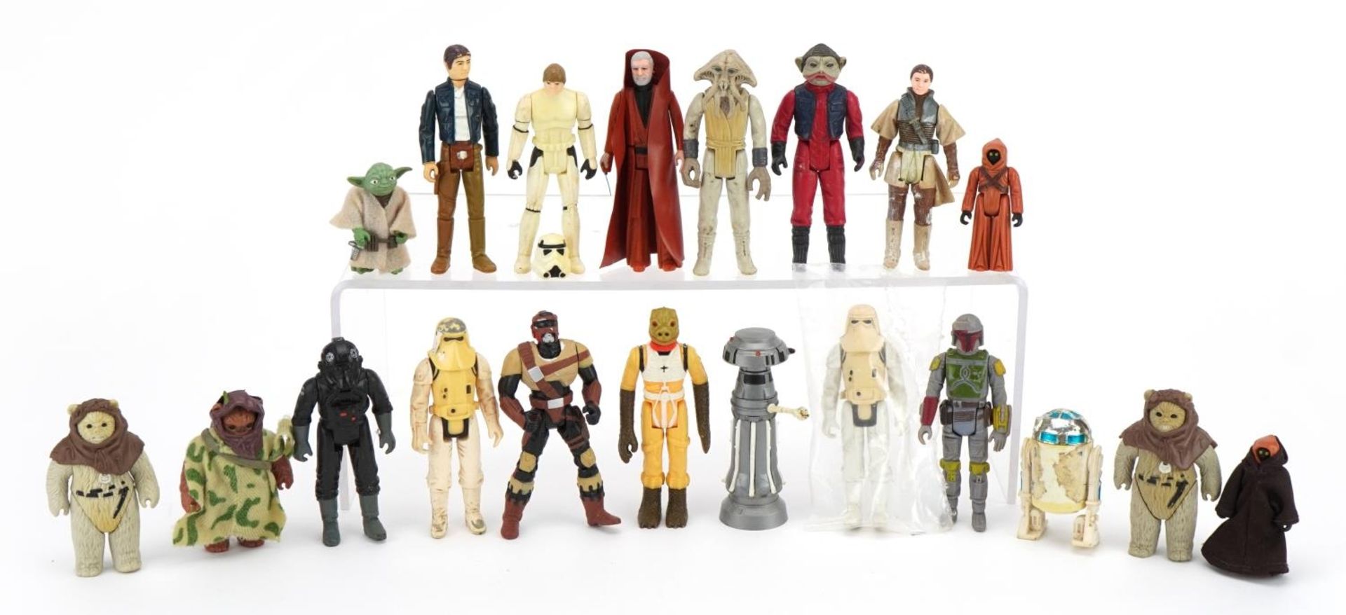 Twenty vintage Star Wars action figures including Luke Skywalker as Stormtrooper, Yoda, Ewoks and