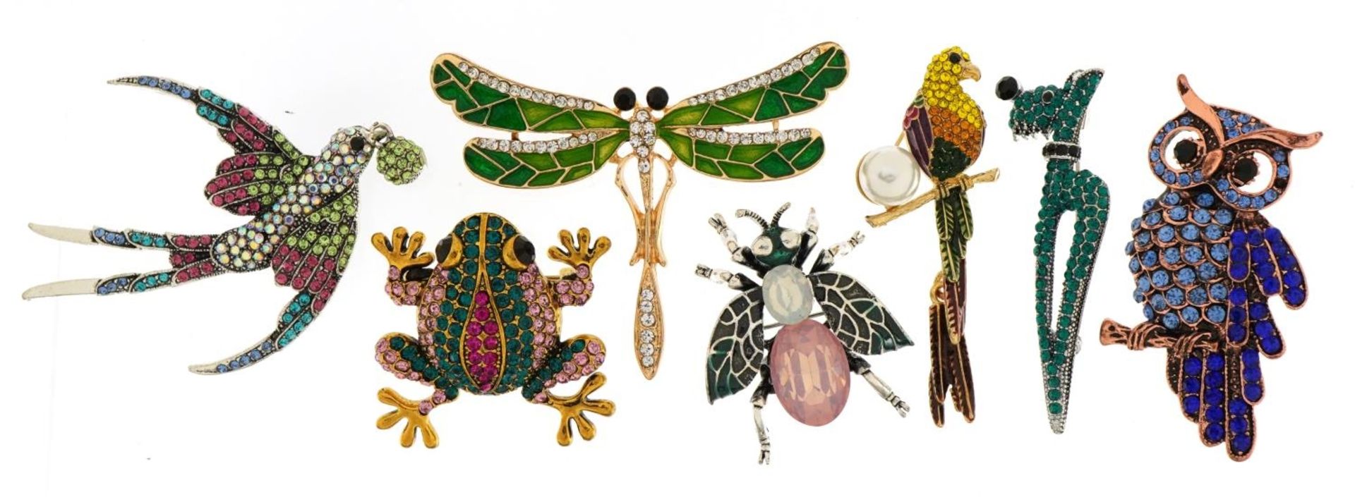 Seven jewelled and enamel animal and insect brooches including dragonfly, parrot and Scottie dog,