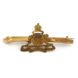 Military interest 9ct gold Ubique cannon sweetheart brooch, 4.4cm wide, 1.9g