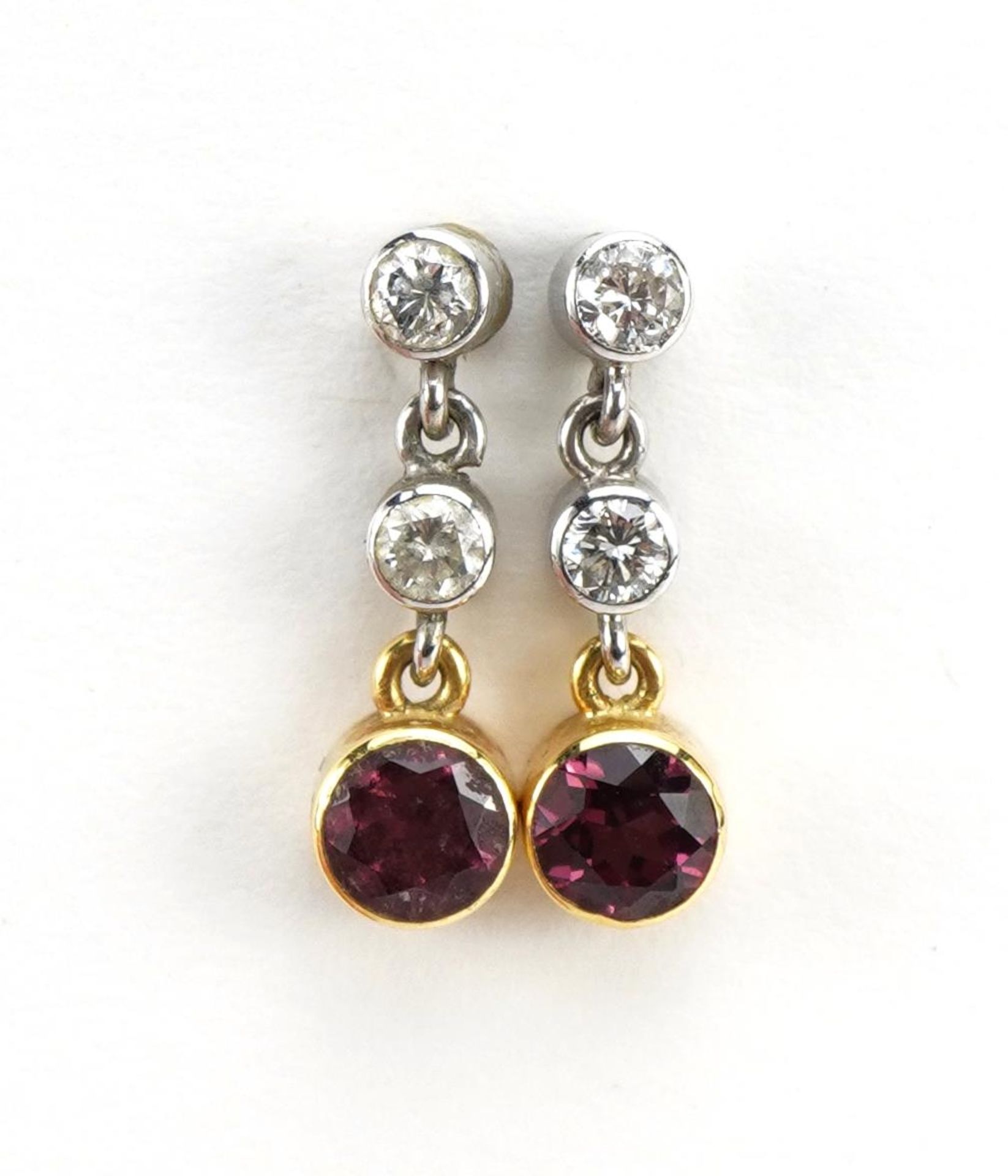 Pair of unmarked 18ct gold diamond and red stone drop earrings, 1.5cm high, 1.8g