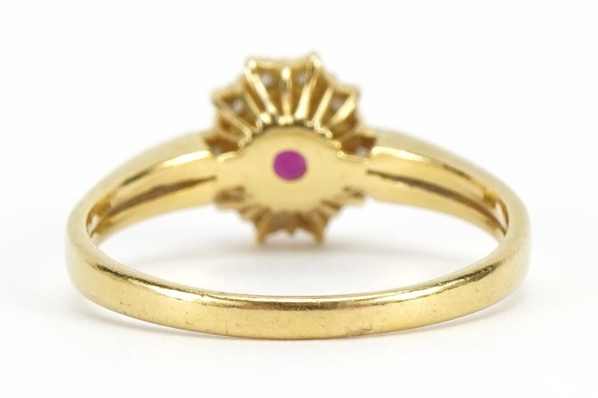 18ct gold ruby and diamond cluster ring, the ruby approximately 5.0mm x 3.9mm, size S/T, 4.0g - Image 2 of 4