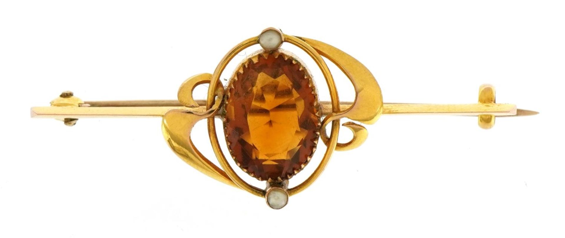 Art Nouveau 9ct gold citrine and seed pearl bar brooch housed in a fitted leather box, 4.1cm wide,