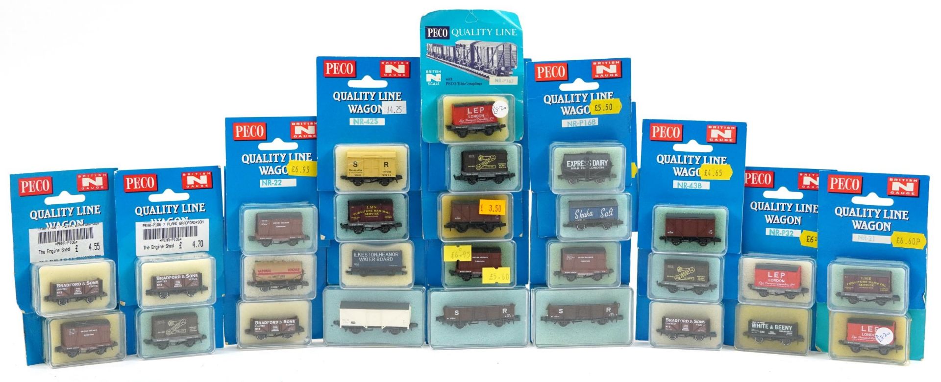 Twenty seven Peco N gauge model railway wagons with cases