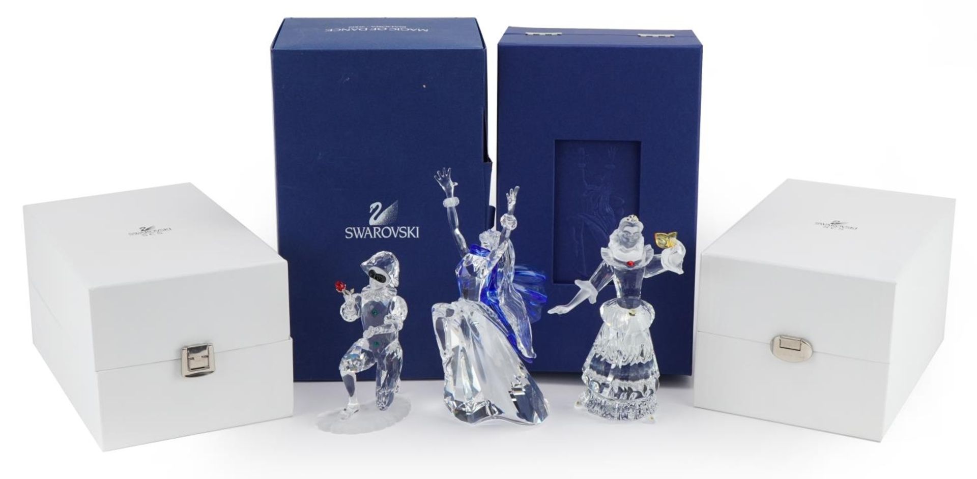 Three Swarovski Crystal figures with boxes including Magic of Dance, the largest 21cm high