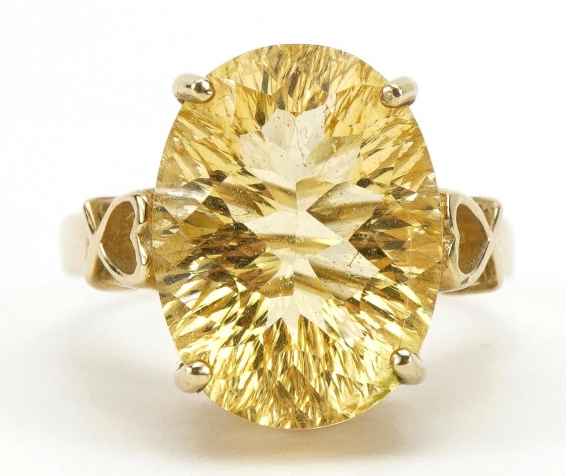 9ct gold citrine solitaire ring with love heart design shoulders, the citrine approximately 15.9mm x