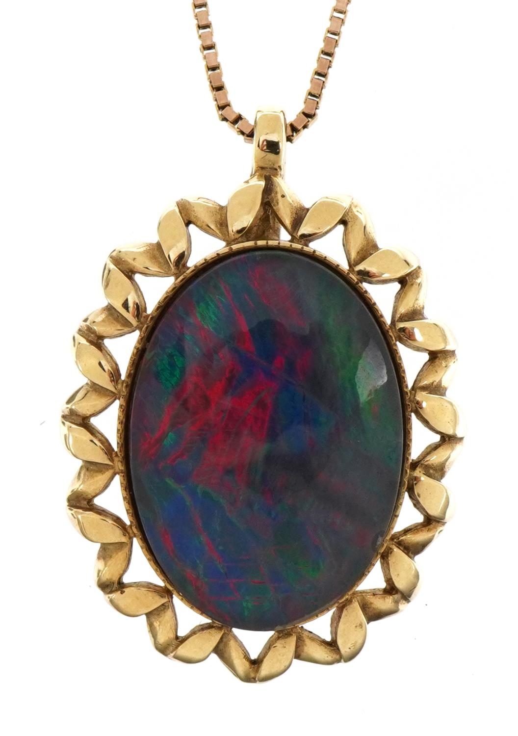 9ct gold oval opal pendant on 9ct gold necklace, 2.7cm high and 50cm in length, total 5.4g