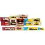 Twelve Corgi diecast collector's vehicles with boxes