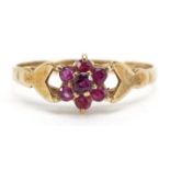 9ct gold ruby flower head ring, size P, 1.4g