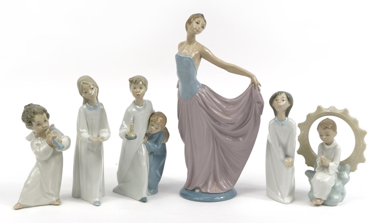 Seven Lladro and Nao figures and figurines including a large dancer and angels, the largest 31cm