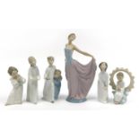 Seven Lladro and Nao figures and figurines including a large dancer and angels, the largest 31cm