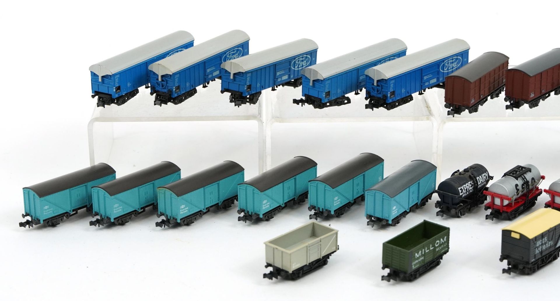 Twenty five N gauge model railway wagons and tankers including Peco and Trix, housed in two - Image 2 of 3