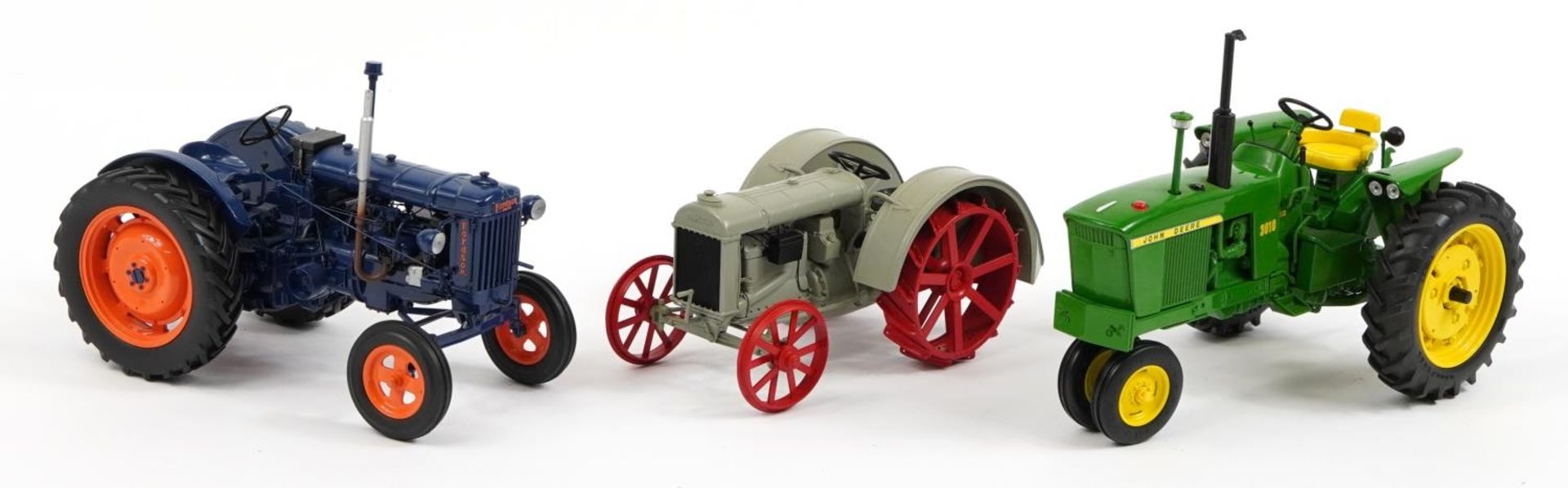 Three diecast model tractors, two with boxes comprising Universal Hobbies Fordson Major E27N, Ertl - Image 2 of 4