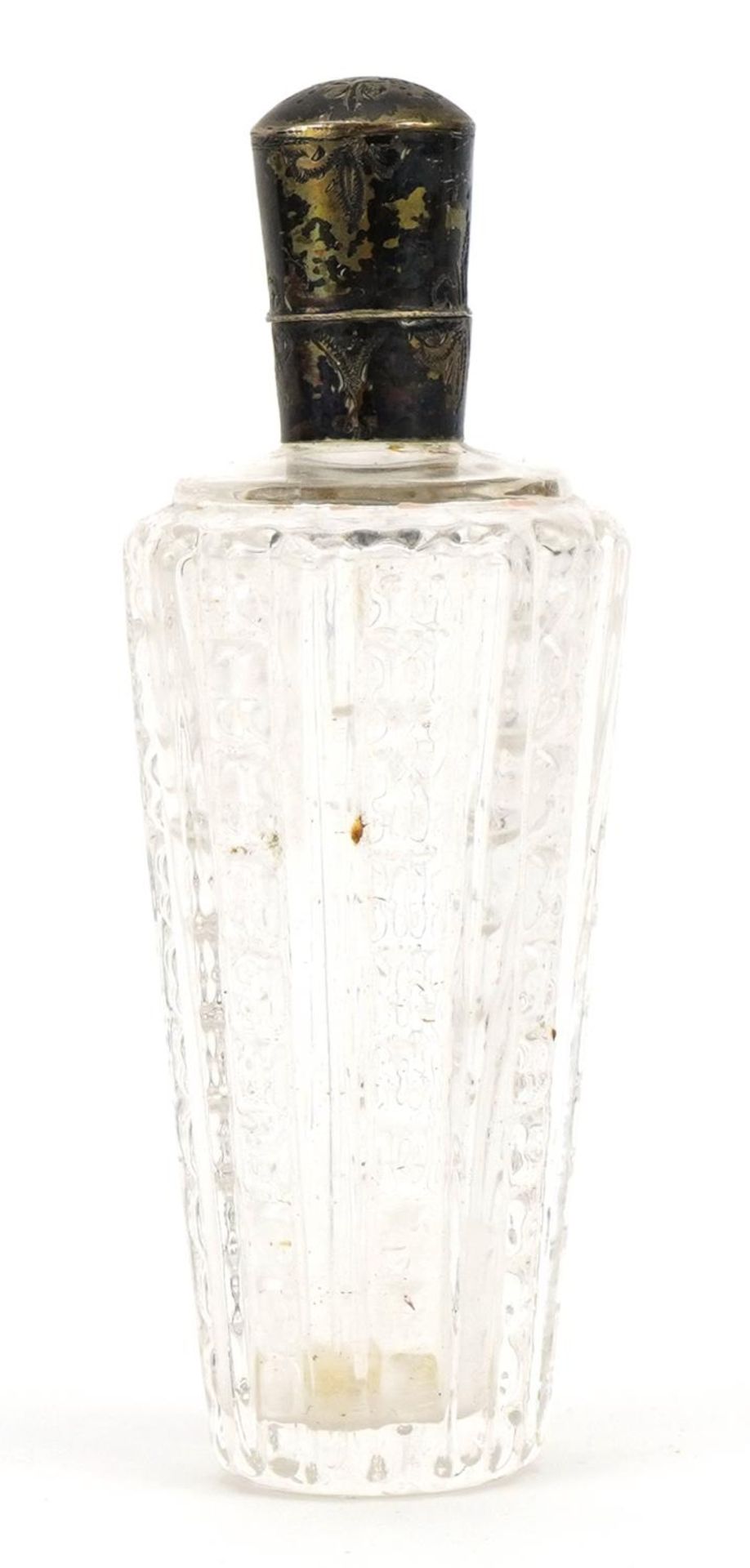 Antique cut glass scent bottle with unmarked silver lid, 9cm high