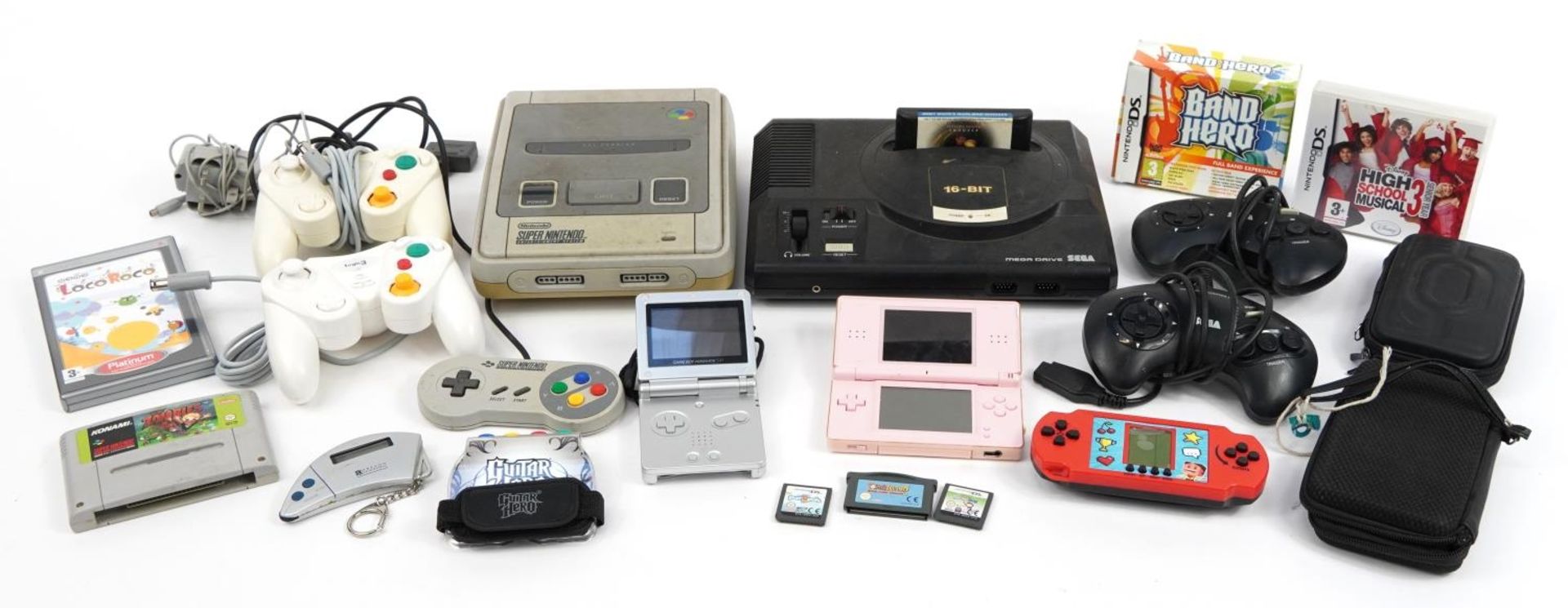 Vintage and later games consoles and hand held games consoles including Super Nintendo, Sega Mega