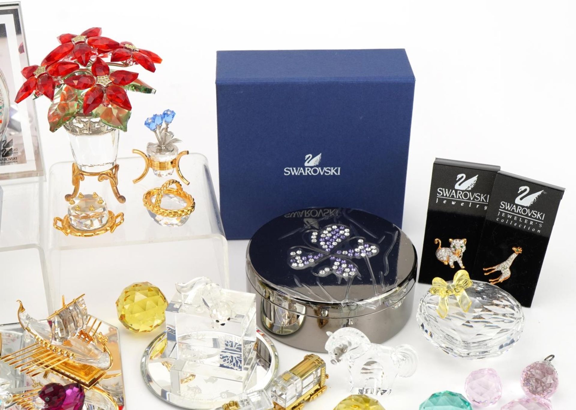 Collection of mostly Swarovski Crystal including miniature flowers raised on a stand, snowflake - Image 3 of 6