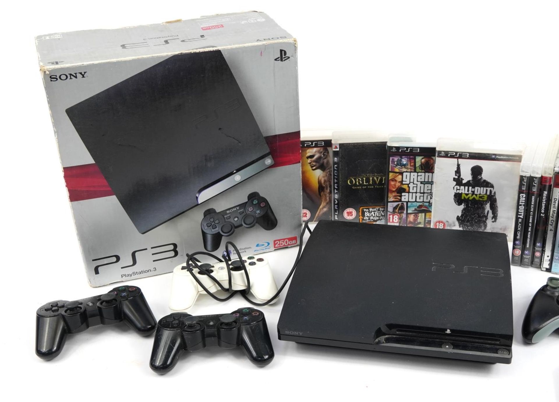 PlayStation 3 games console with box and a collection of games - Image 2 of 3