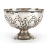 Elkington & Co, Edward VII silver pedestal bowl embossed with foliage and berries, numbered 26359,