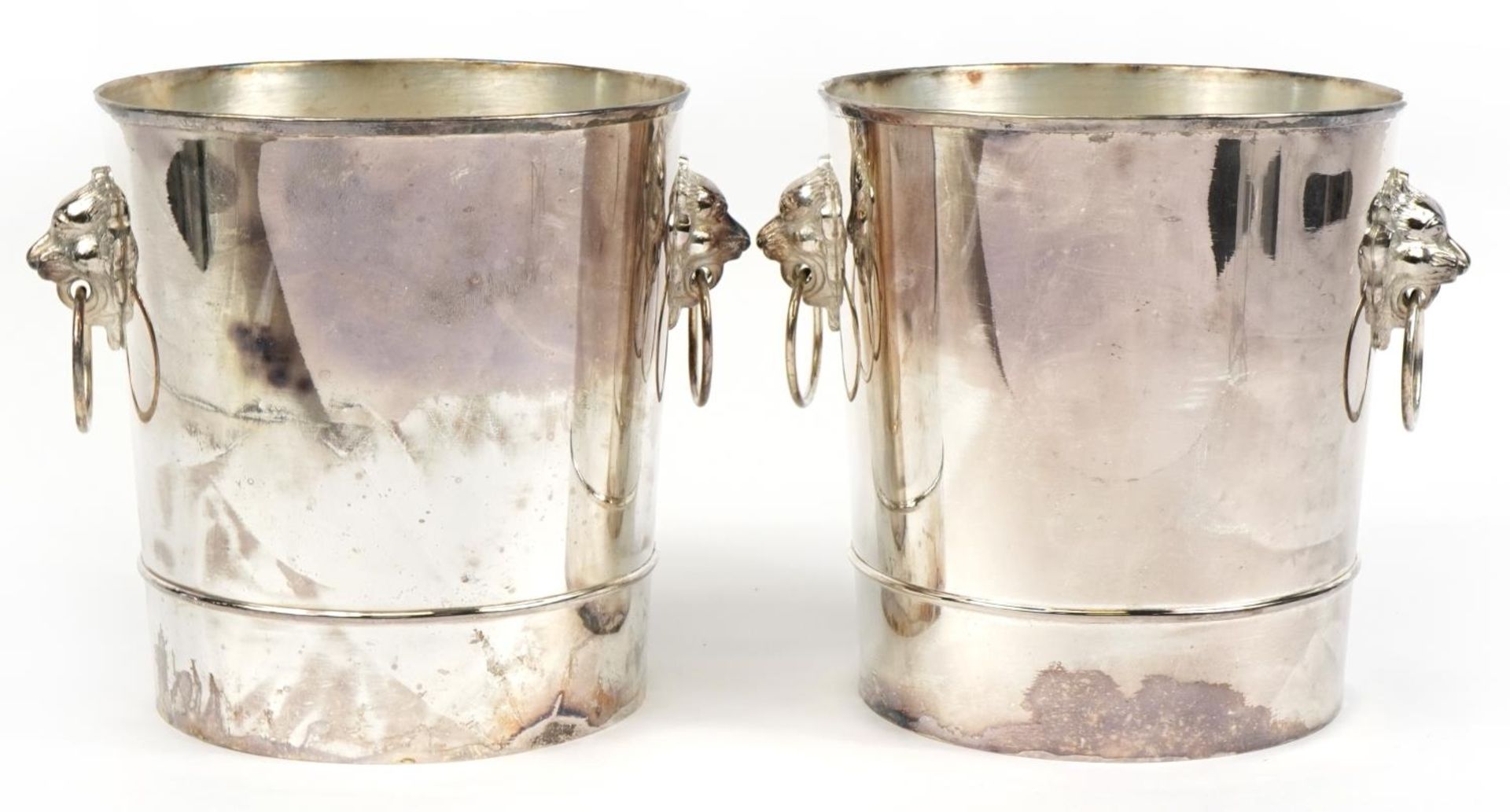 Pair of silver plated Champagne ice buckets with ring turned mask handles, each 23cm high