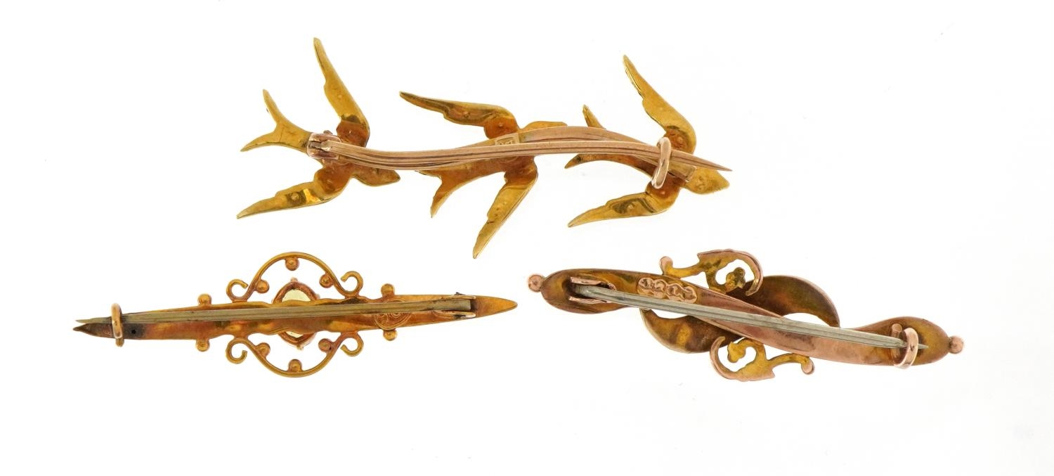 Three antique and later gold brooches including a swallow design example set with turquoise and seed - Image 2 of 3