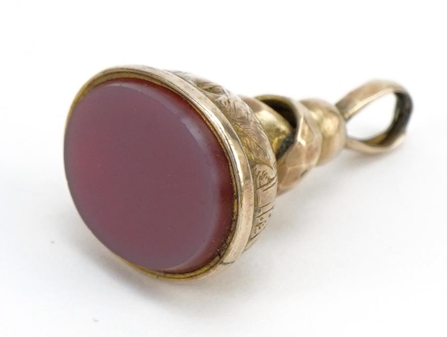 Antique unmarked gold carnelian seal fob with engraved decoration, 2.1cm high, 1.9g