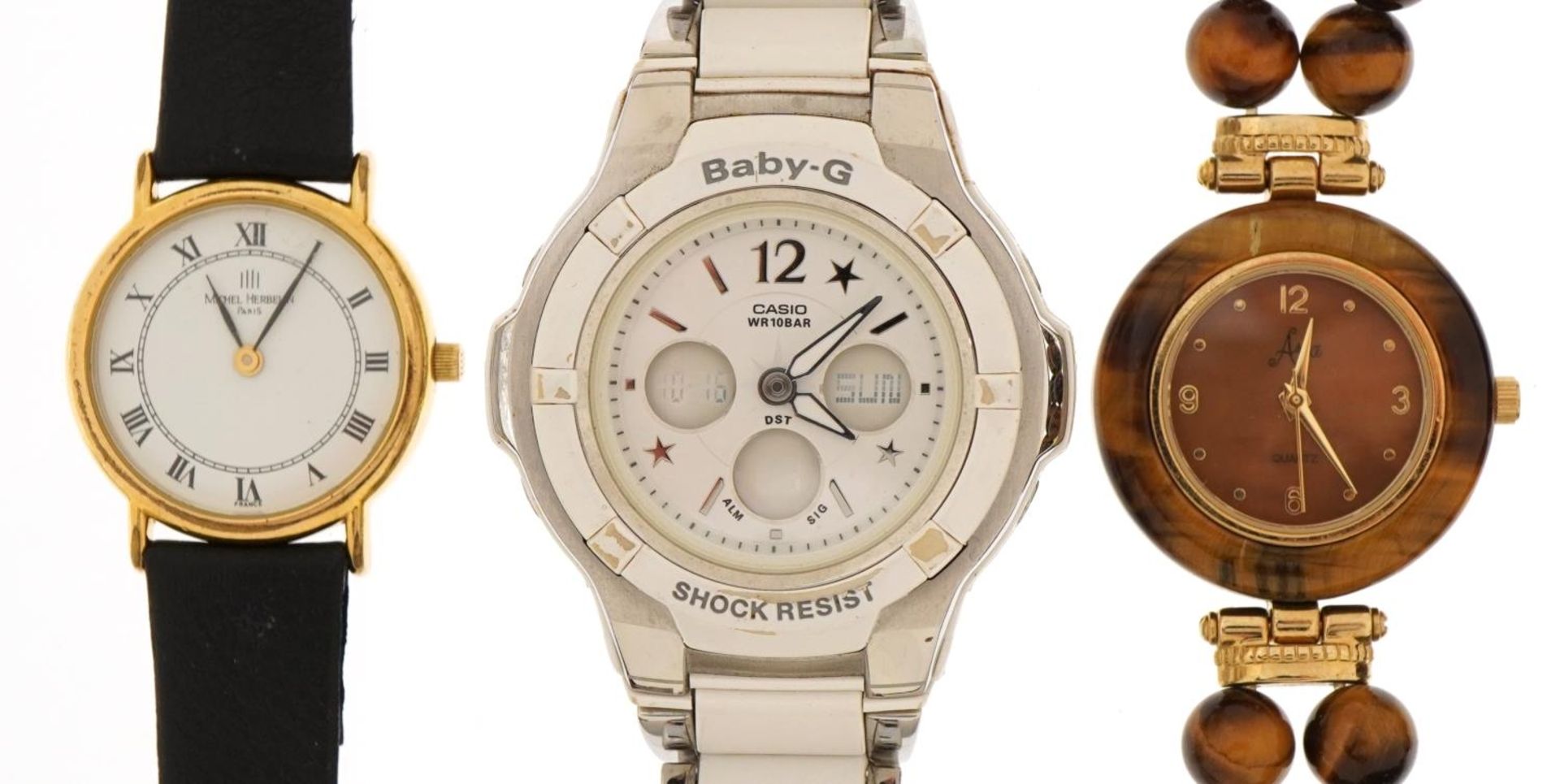 Three ladies wristwatches comprising Casio Baby-G, Avia with tiger's eye bezel and strap and