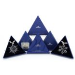 Two Swarovski Crystal Christmas ornaments with boxes comprising dates 2010 and 2011
