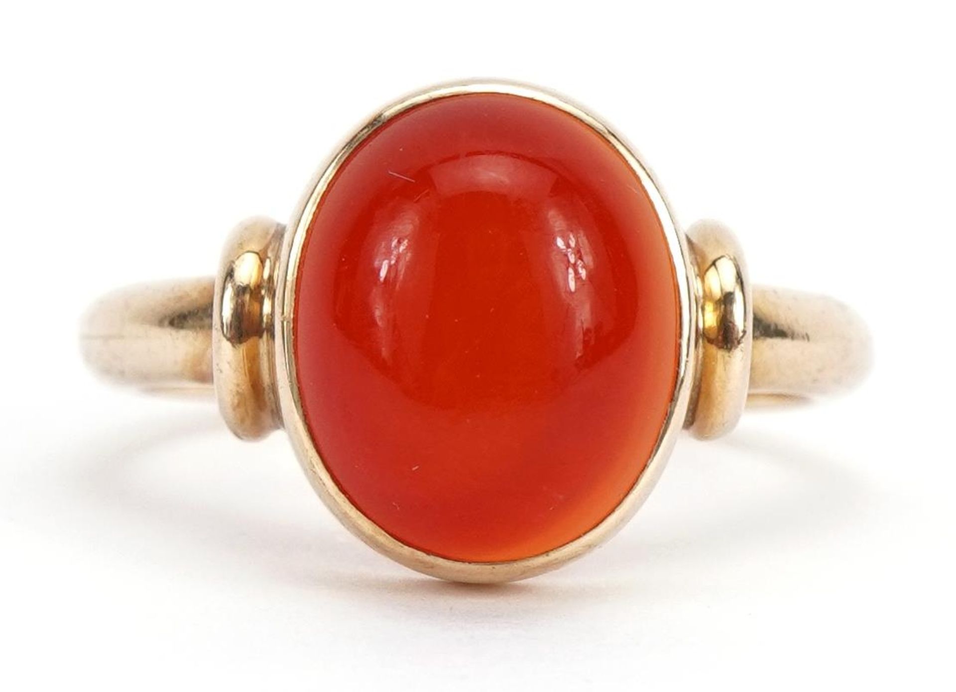 Jon & Valerie Hill, 9ct gold cabochon carnelian ring housed in a Jon & Valerie Hill box,