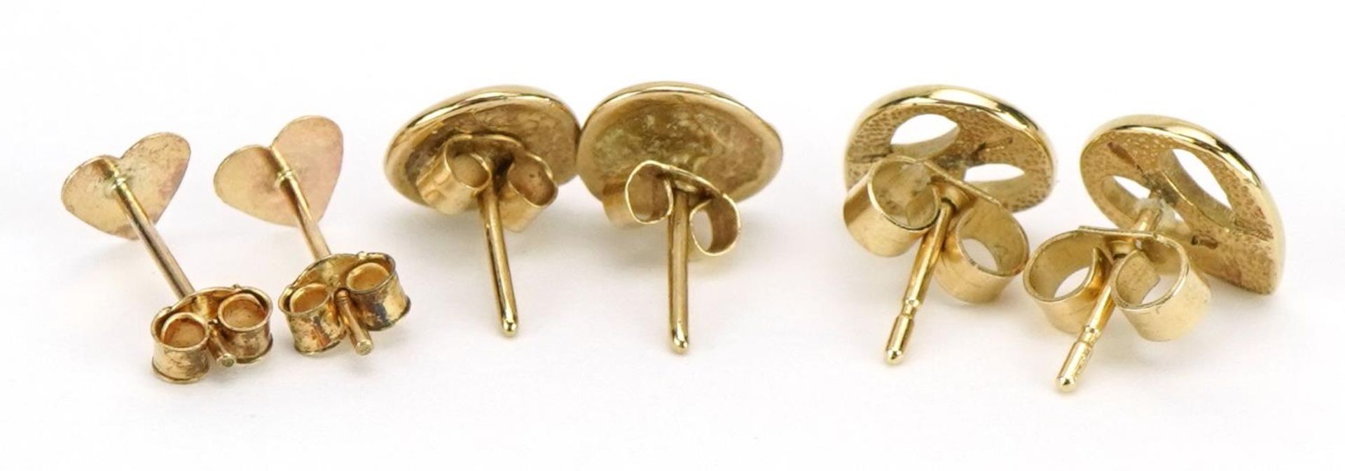 Three pairs of 9ct gold stud earrings, the largest 9.5mm high, total 2.5g - Image 2 of 2