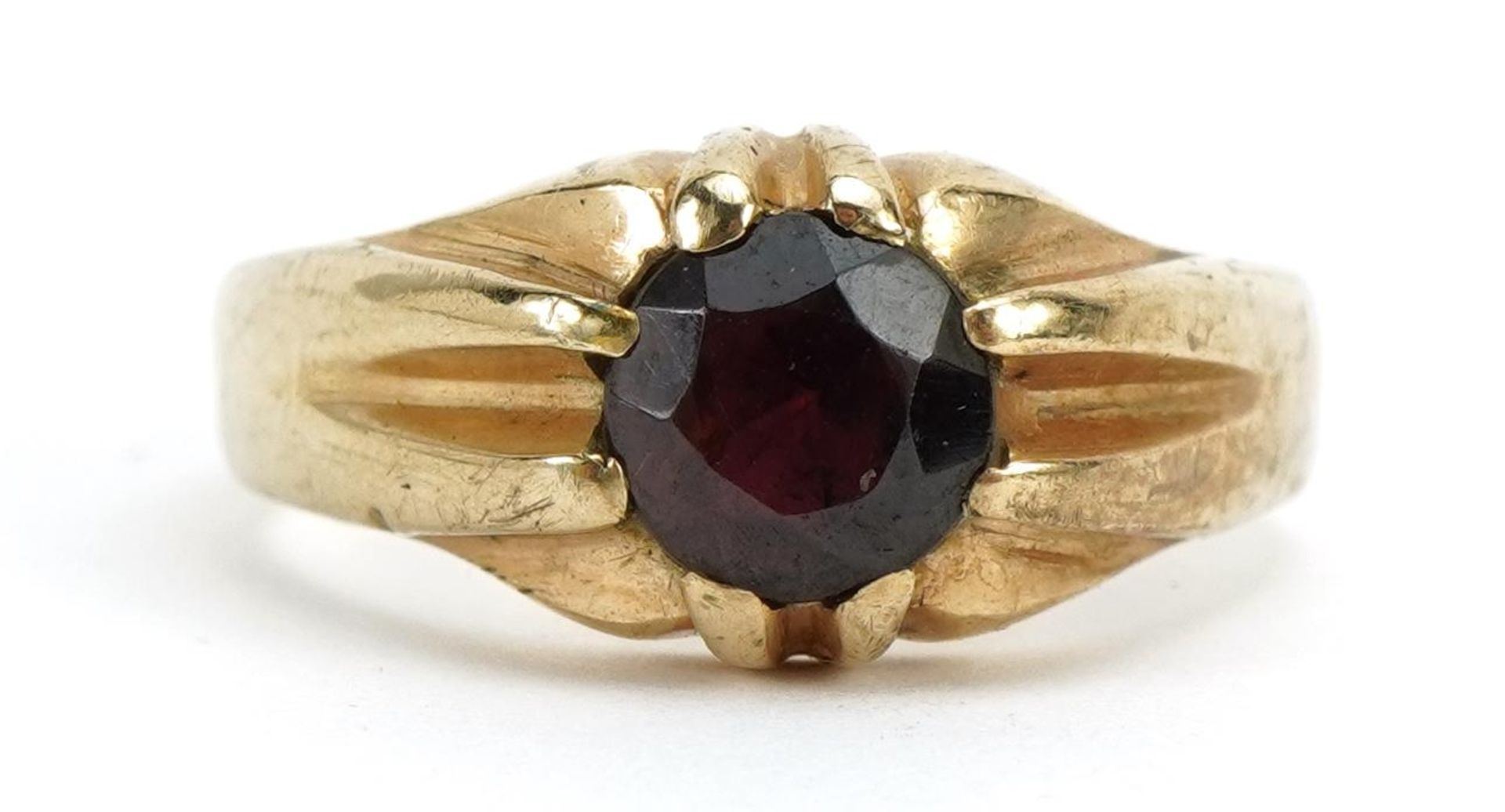 9ct gold garnet solitaire ring, the garnet approximately 6.9mm in diameter, size Q, 6.0g