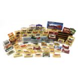 Collection of diecast advertising collector's vehicles and boats with boxes including Days Gone,