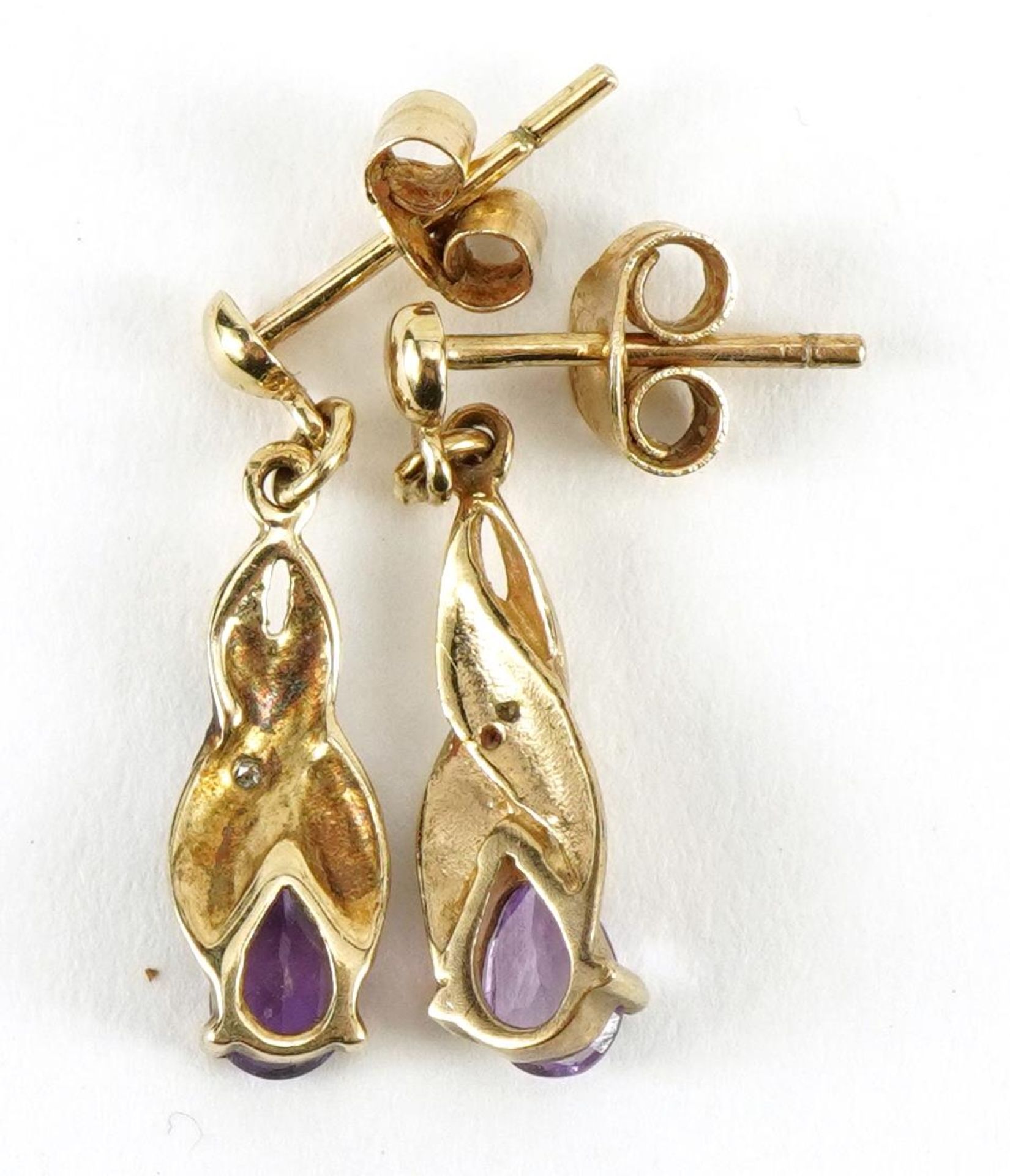 Pair of unmarked gold amethyst and diamond drop earrings, 1.9cm high, 1.1g - Image 2 of 2