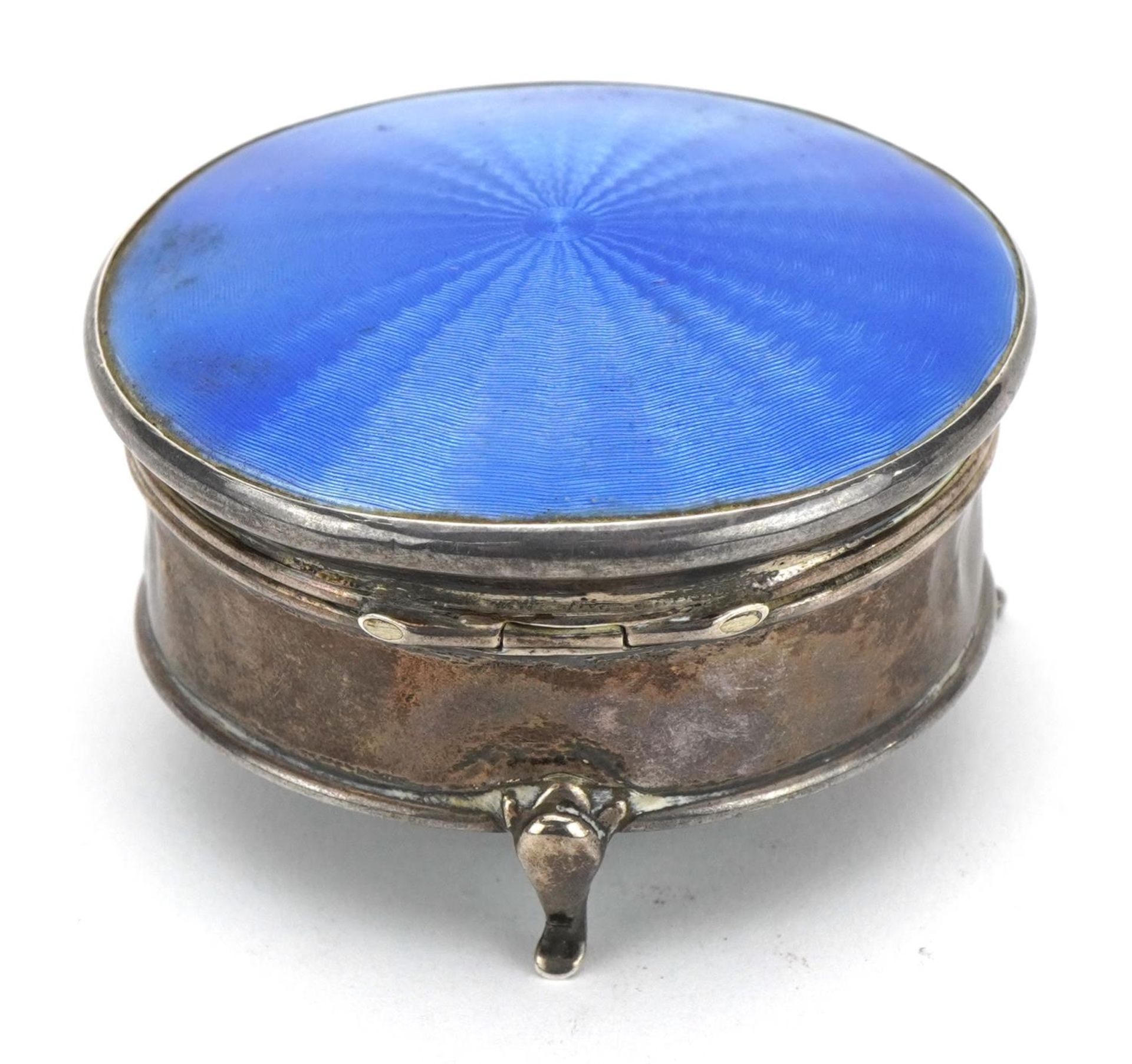 George V circular silver and blue guilloche enamel jewel box with hinged lid, raised on three - Image 5 of 7