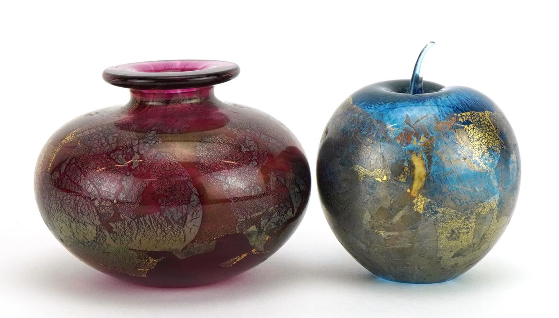 Isle of Wight iridescent art glassware comprising a vase and apple paperweight, each with paper
