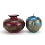 Isle of Wight iridescent art glassware comprising a vase and apple paperweight, each with paper