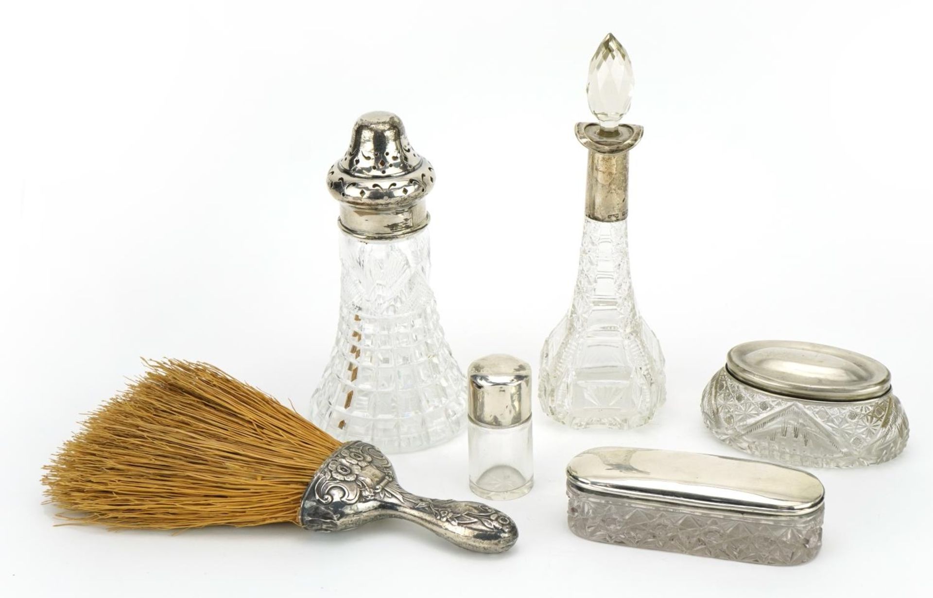 Silver mounted objects comprising two cut glass scent bottles, two cut glass jars, cut glass