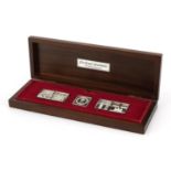 The Queen's Silver Jubilee Royal Standard's silver ingots housed in a fitted mahogany case, the