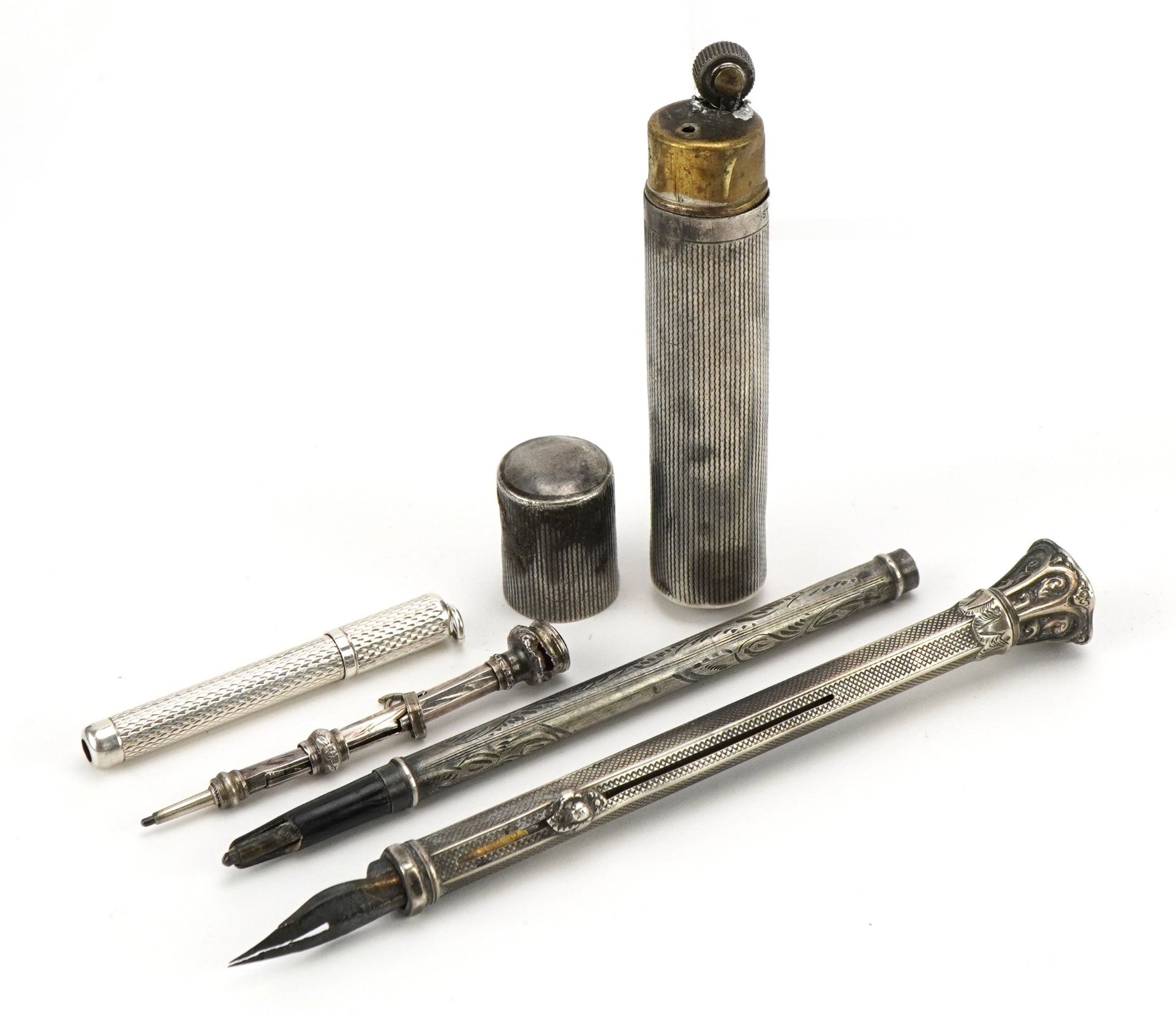 Four antique and later silver propelling pens and pencils and a sterling silver cased pocket lighter