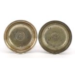 Pair of Persian circular 800 grade coin set silver dishes, 7cm in diameter, 28.2g