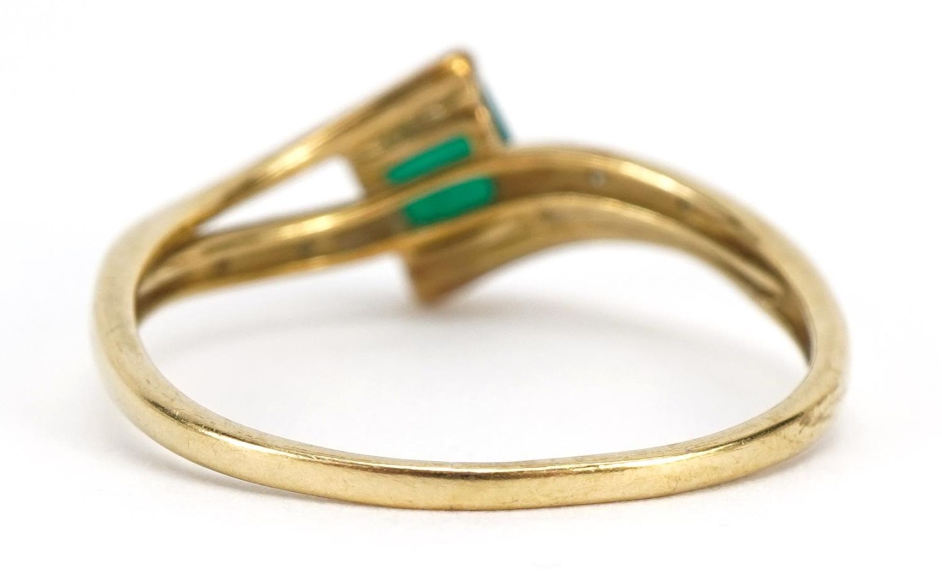 9ct gold emerald and diamond crossover ring, the emerald approximately 5.1mm wide, size T, 1.8g - Image 2 of 3