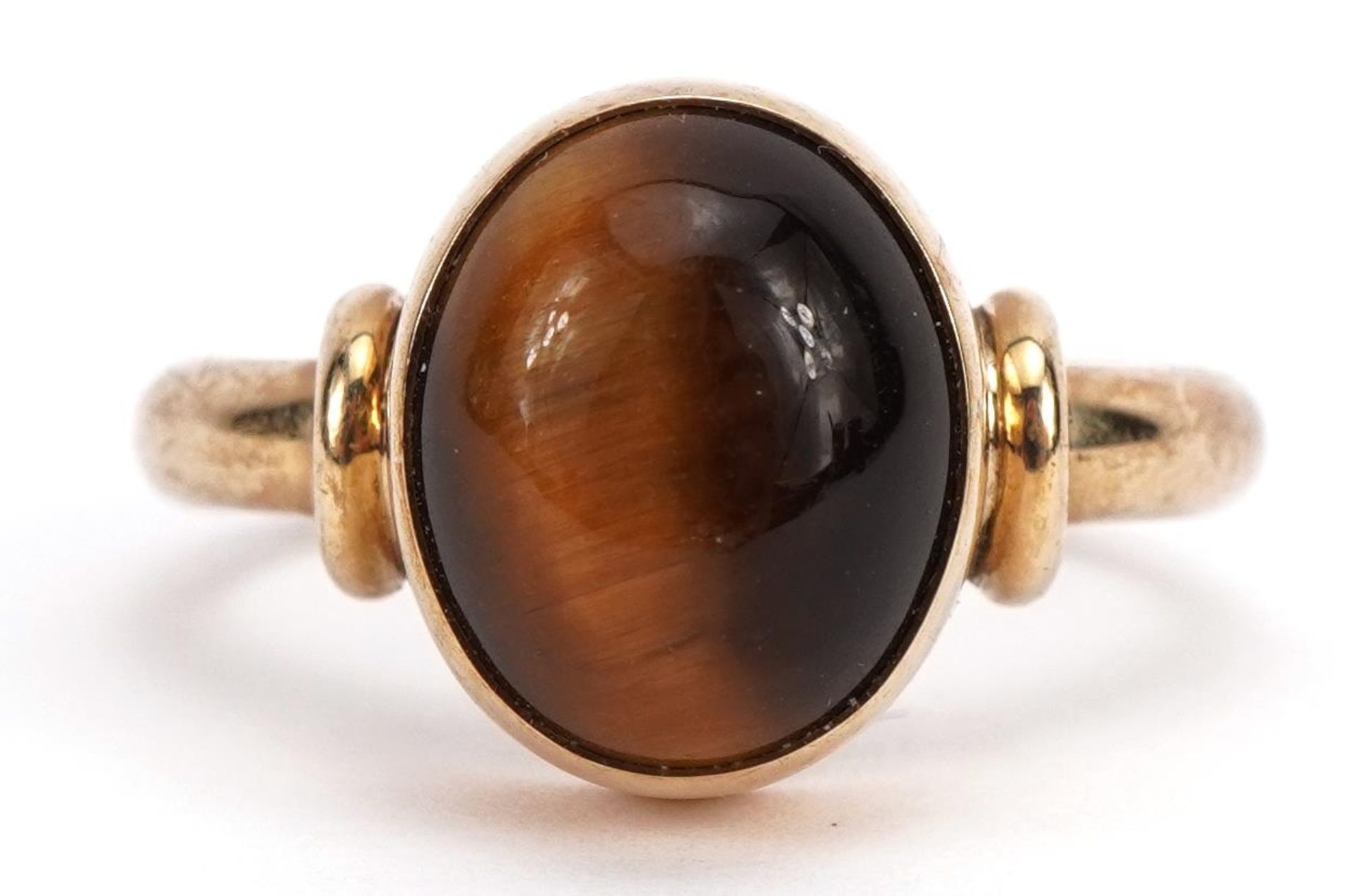 Jon & Valerie Hill, 9ct gold cabochon tiger's eye ring housed in a Jon & Valerie Hill box,