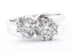 18CT WHITE GOLD & DIAMOND CROSSOVER RING