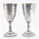 PAIR OF EARLY 20TH CENTURY RUSSIAN SILVER VODKA DRINKING CUPS